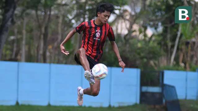 Achmad Maulana bersama Arema FC. (Bola.com/Iwan Setiawan)