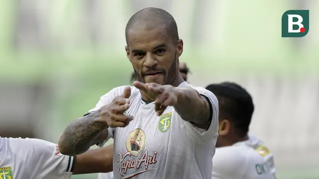 Selebrasi striker Persebaya Surabaya, David da Silva, setelah mencetak gol ke gawang Bhayangkara FC di Stadion Madya, Jakarta, Sabtu (31/8/2019). (Bola.com/Yoppy Renato)