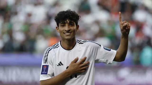 Pemain Timnas Irak, Ali Jassim. (KARIM JAAFAR / AFP)